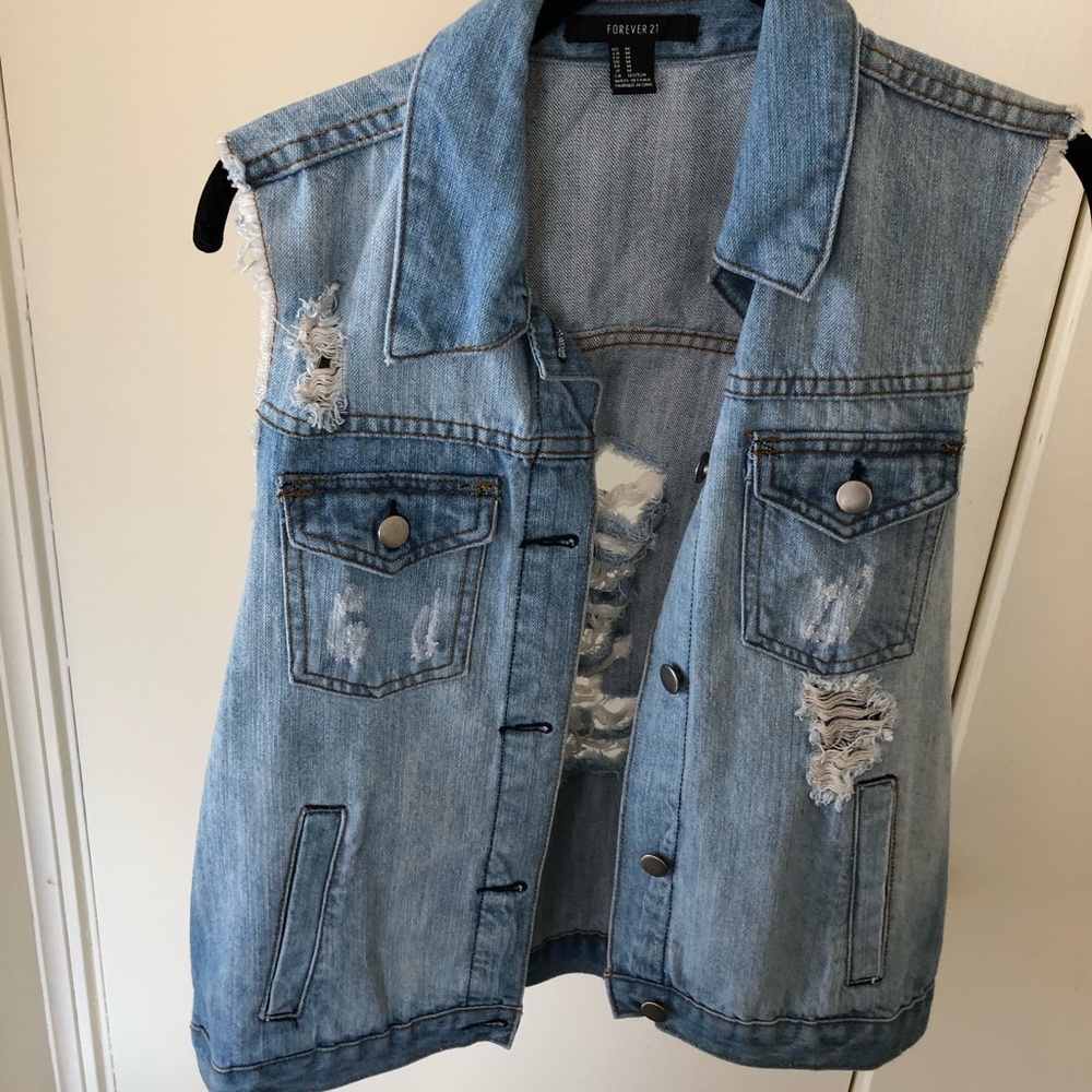 Distressed denim vest